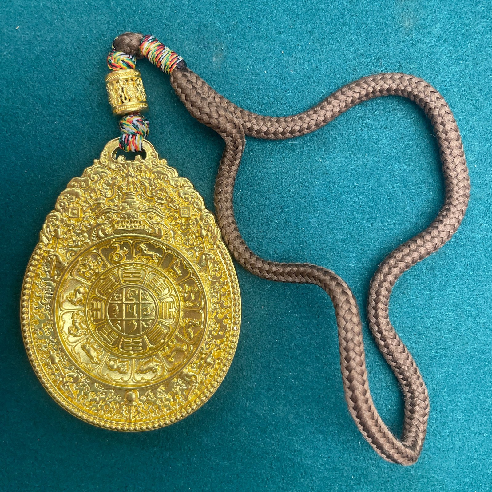 Zodiac Relief Pendant with Braided Cord
