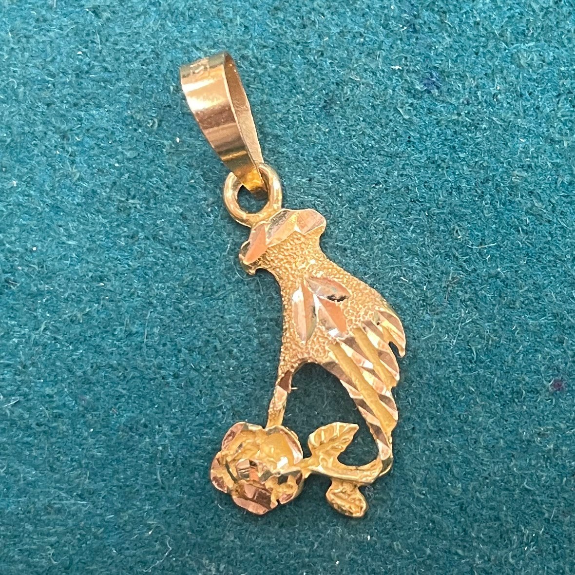 Hand-Holding-Rose Pendant
